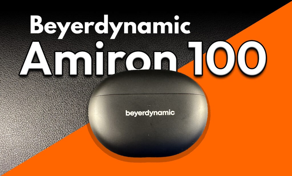 Beyerdynamic Amiron 100 laddningsetui på svart och orange bakgrund – Techsajten